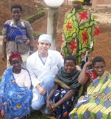 Dr. Nosti with villagers